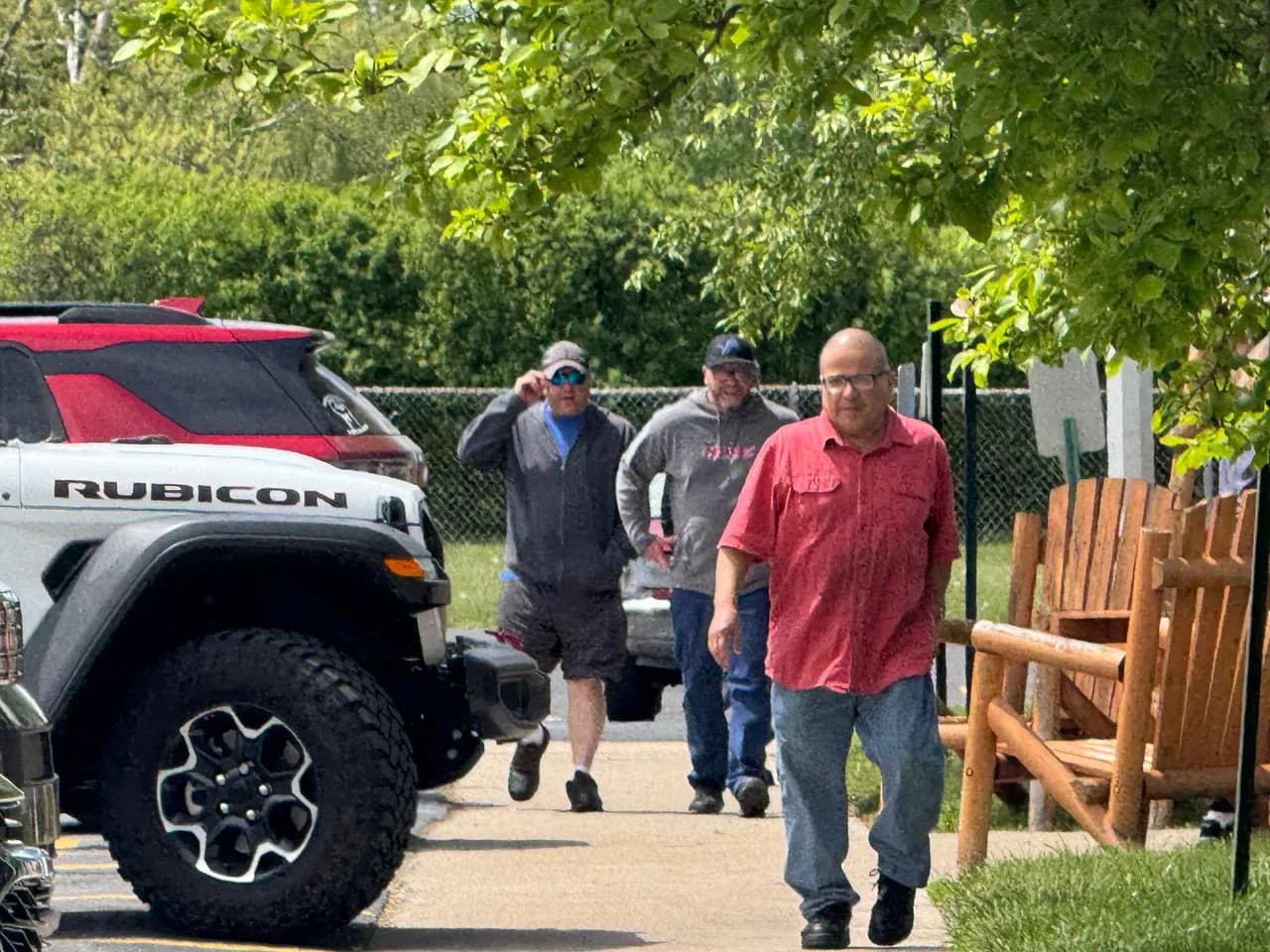 Autoworkers walking back from the union hall after voting on the strike authorization